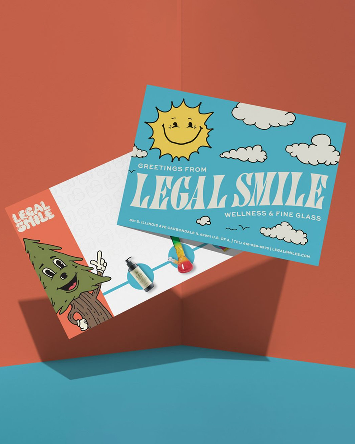 a mockup of a illustrative postcard for legal smile glass shop