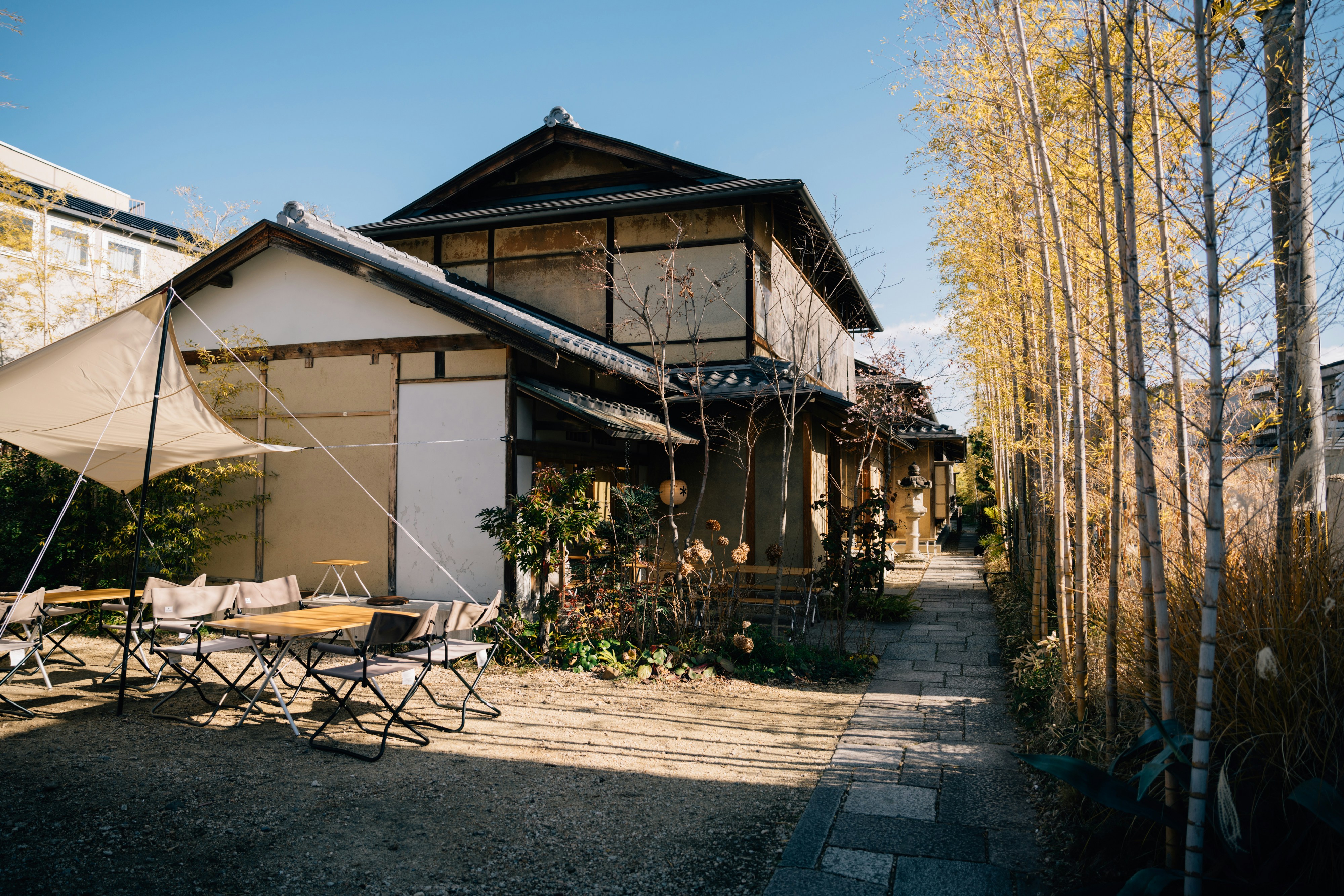 Traditional Japanese akiya home with tiled roof and wooden exterior in rural countryside