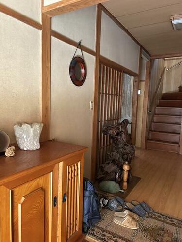 Traditional 4DK home in Tane, Higashiomi City, Shiga. Spacious layout, wooden interiors, and potential for renovation. Ideal for rural living in Japan.