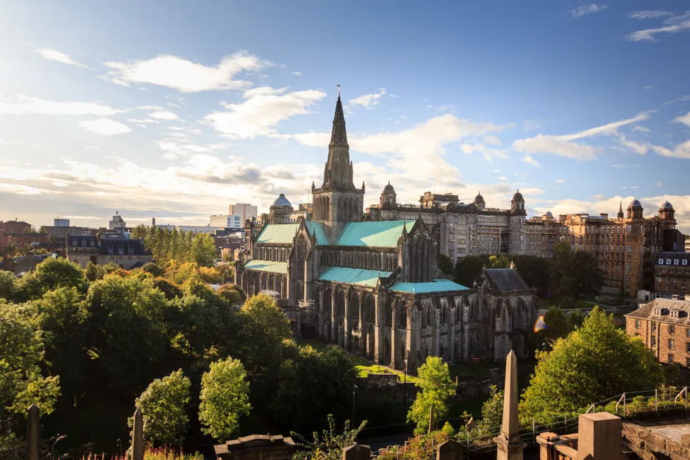 a view of a city with a church and a church tower
