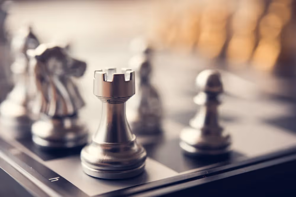 a chess set on a table with a blurry background