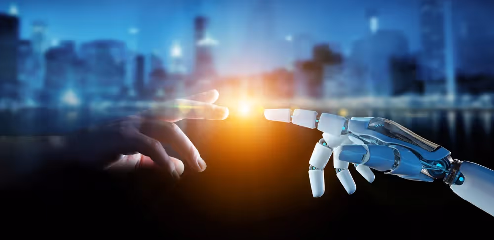 a robot hand reaching a human hand