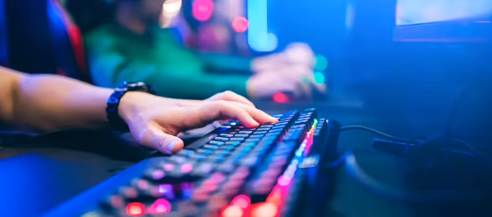 a person is typing on a computer