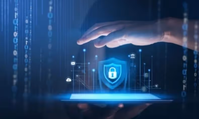 a person holding a tablet with a shield on it