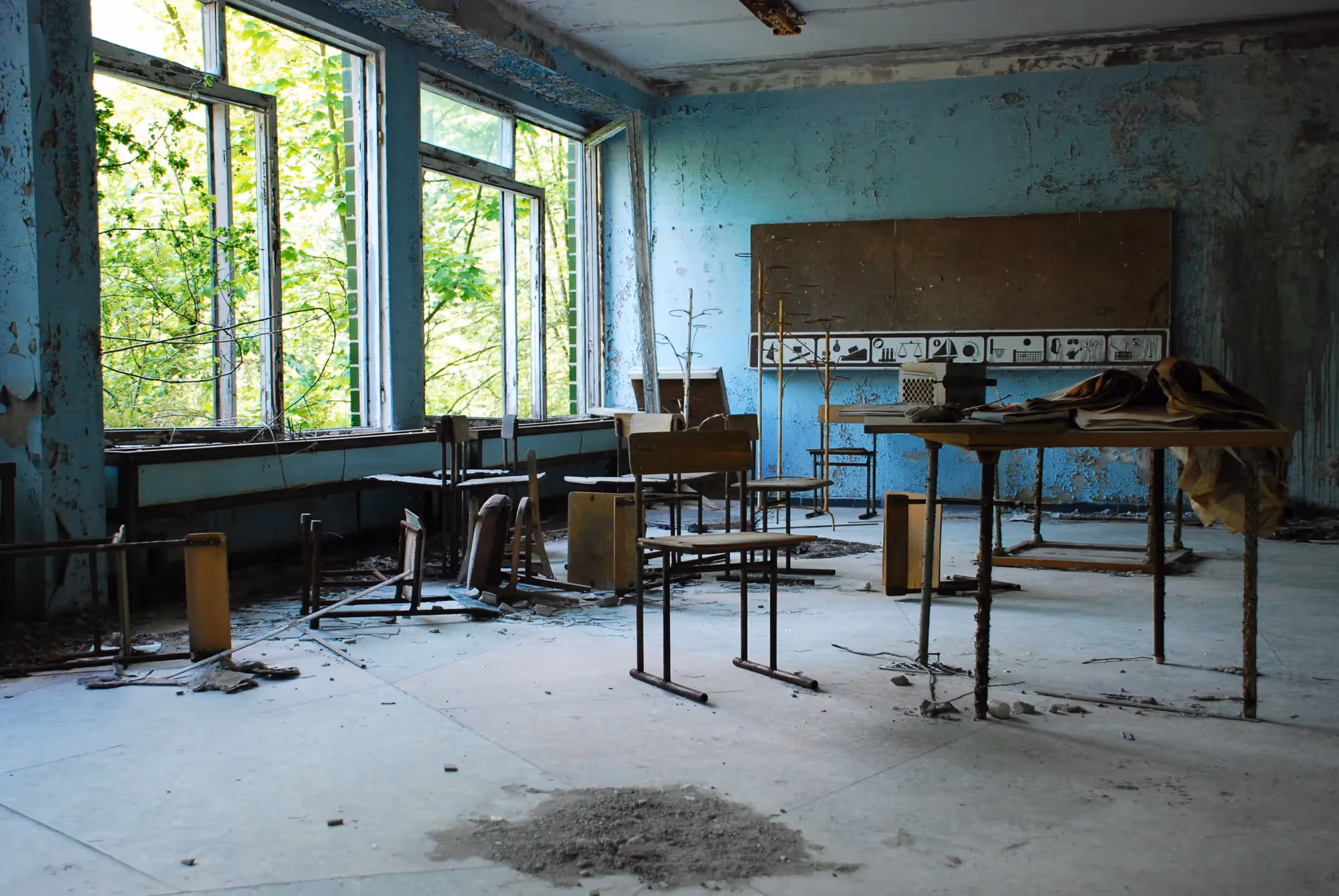 a room with a desk and a window