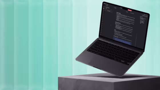 Dark laptop floating above a pedestal displaying code on a dark-themed editor against a teal background.