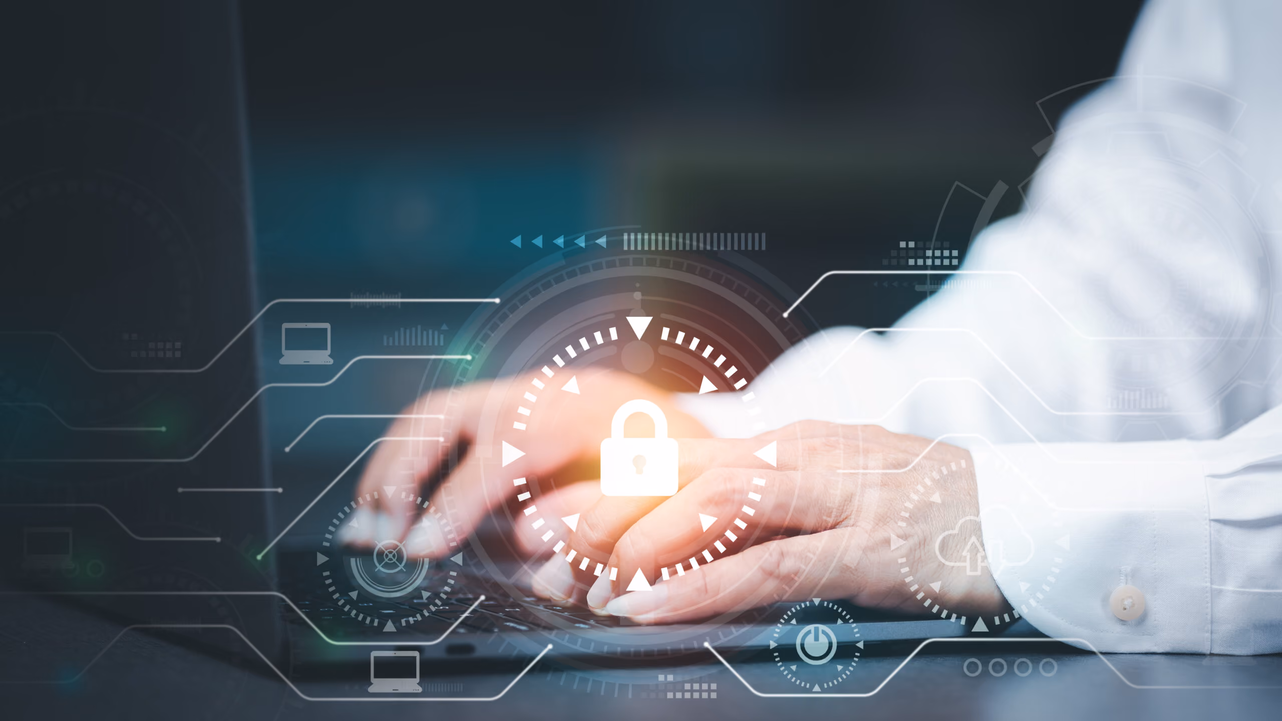 Hands typing on laptop keyboard with digital lock and cybersecurity icons overlay.