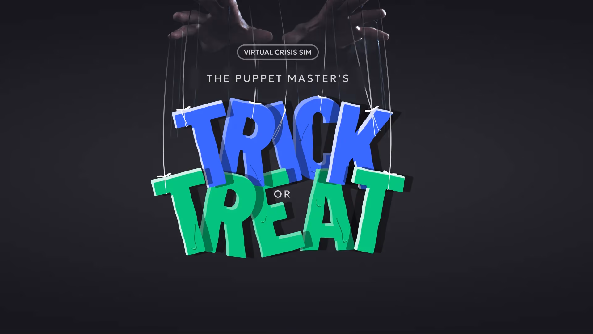 Hands manipulating strings to hold colorful letters spelling Trick or Treat for a virtual crisis sim.