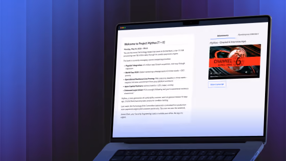 Laptop screen displaying a project update titled 'Project Mythos' with text and an embedded video thumbnail.