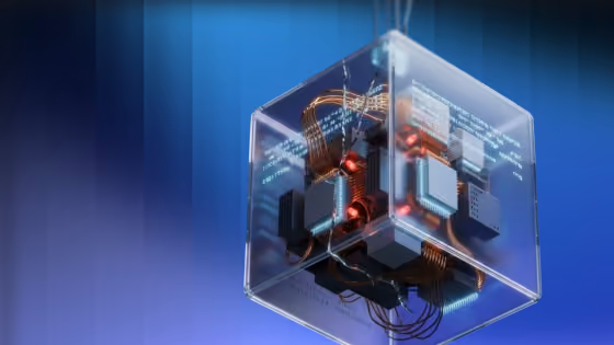 Transparent cube containing glowing circuitry and wires floating against a blue gradient background.