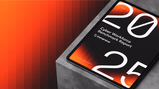 Tablet displaying '2025 Cyber Workforce Benchmark Report' on a grey block with orange gradient background.