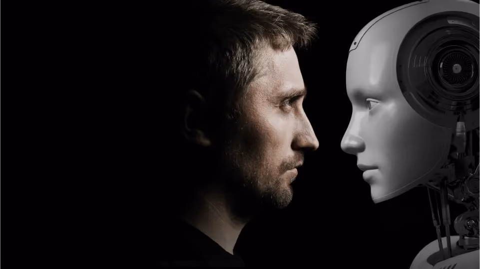 Profile view of a man and a humanoid robot facing each other against a black background.