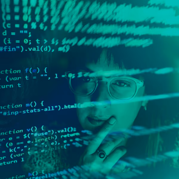 Person with glasses looking thoughtfully at a transparent screen displaying programming code.