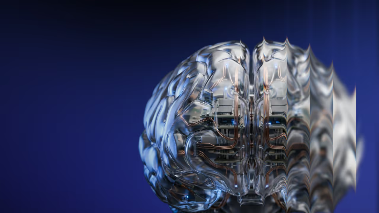 Transparent metallic brain with visible circuitry and a rippling surface.