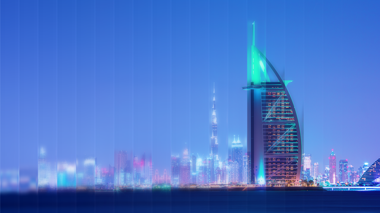 Night skyline of Dubai with illuminated Burj Al Arab and Burj Khalifa skyscrapers by the water.