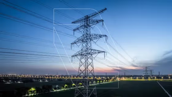 Electricity pylon at dusk with the Immersive outline symbol.
