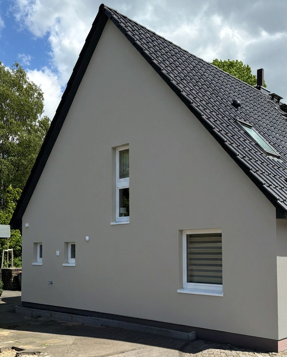 Fassadenvisualisierung: Einfamilienhaus mit Fassadenfarbe Little Greene „Urbane Grey“
