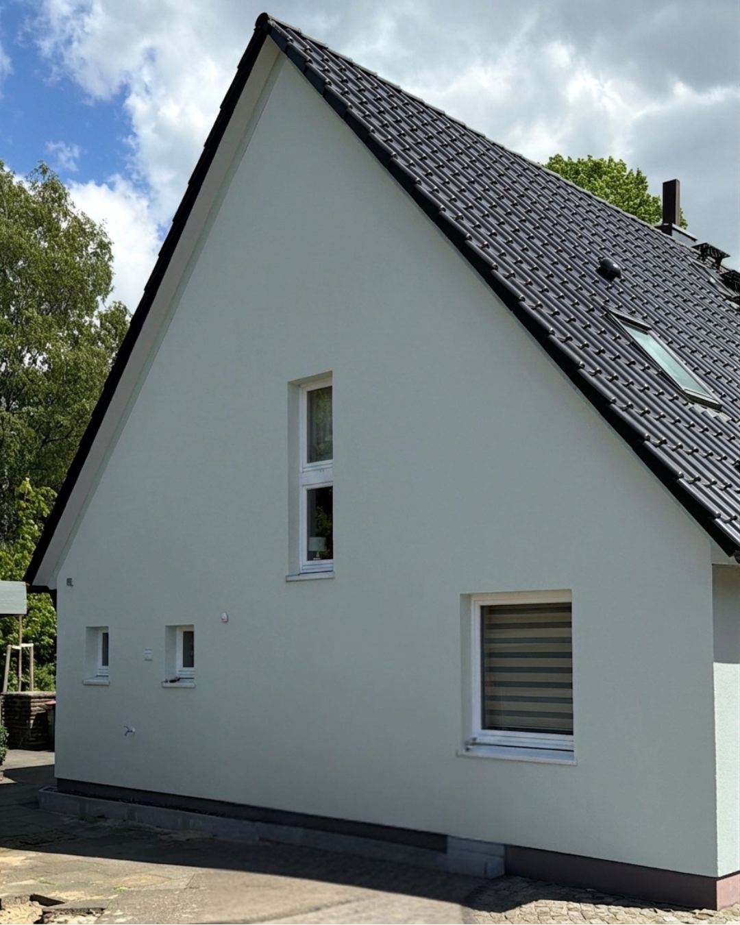 Fassadenvisualisierung: Einfamilienhaus mit Fassadenfarbe Little Greene „Celestial Blue“