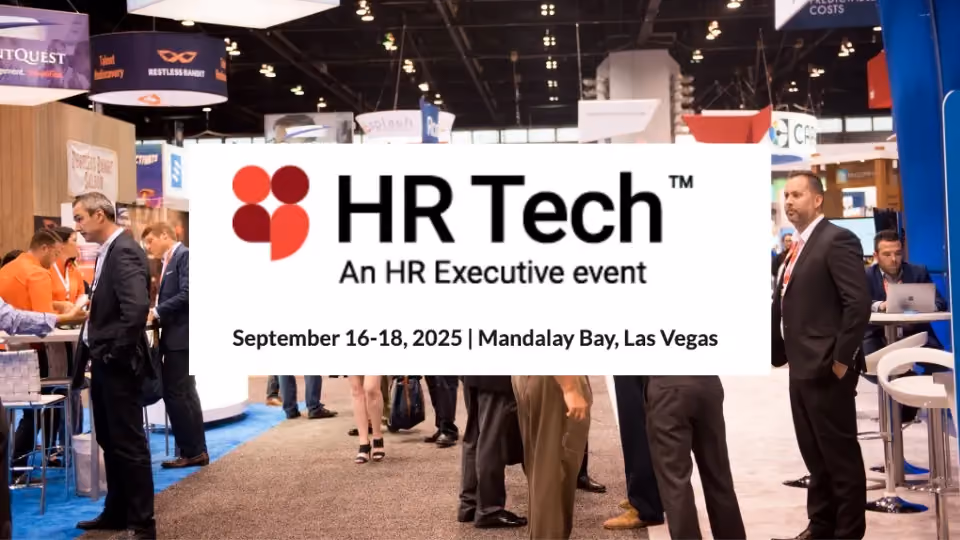 HR Tech conference banner above a busy exhibition floor