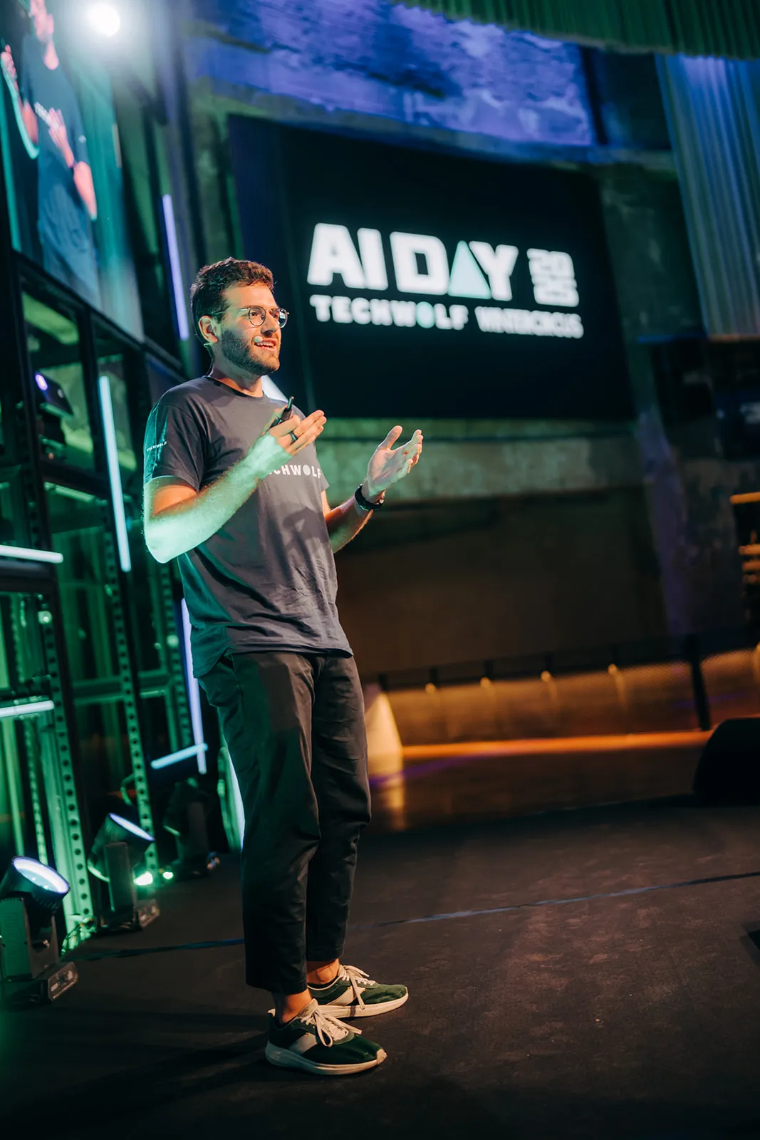 Jeroen Van Hautte speaking on stage at AI Day 2025