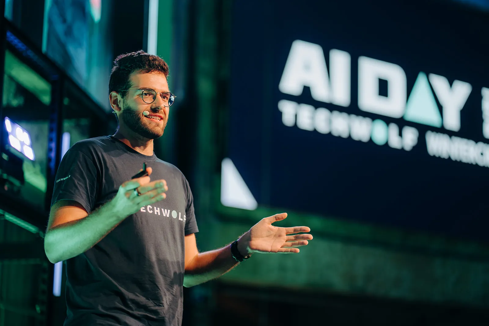 Jeroen Van Hautte speaking on stage at AI Day 2025