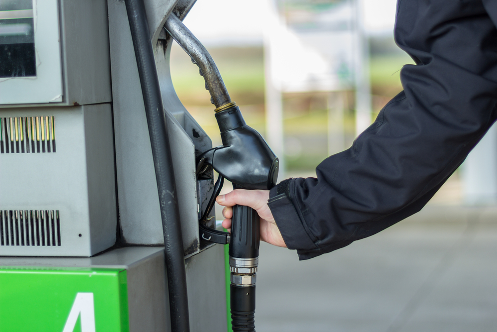 Hand holding fuel pump