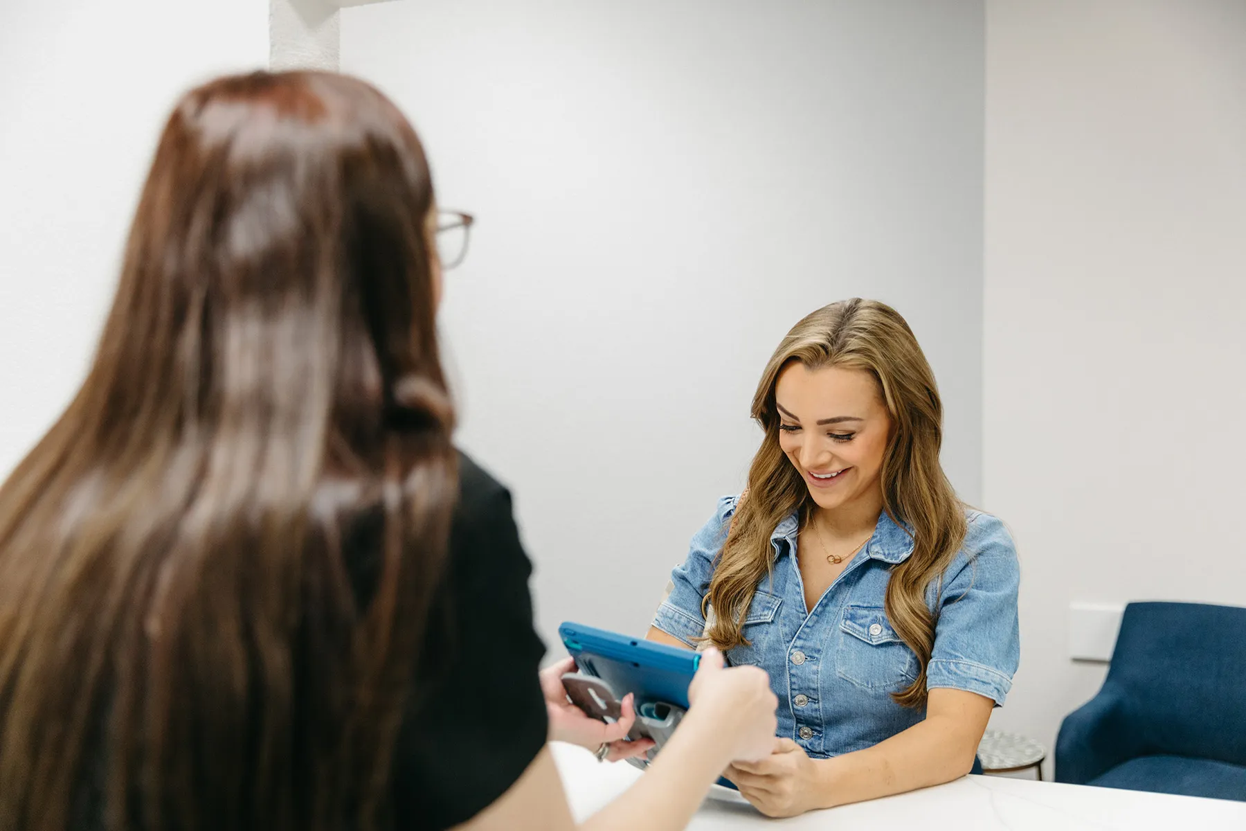 A Patient Filling Out Forms