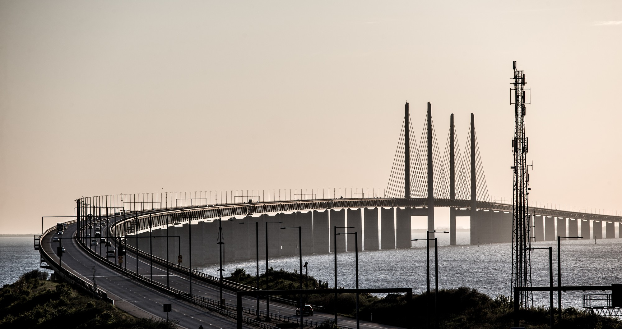 Bridge connecting two shores, symbolizing the gap between Product-Market Fit and Product-Company Fit that product management frameworks alone cannot bridge
