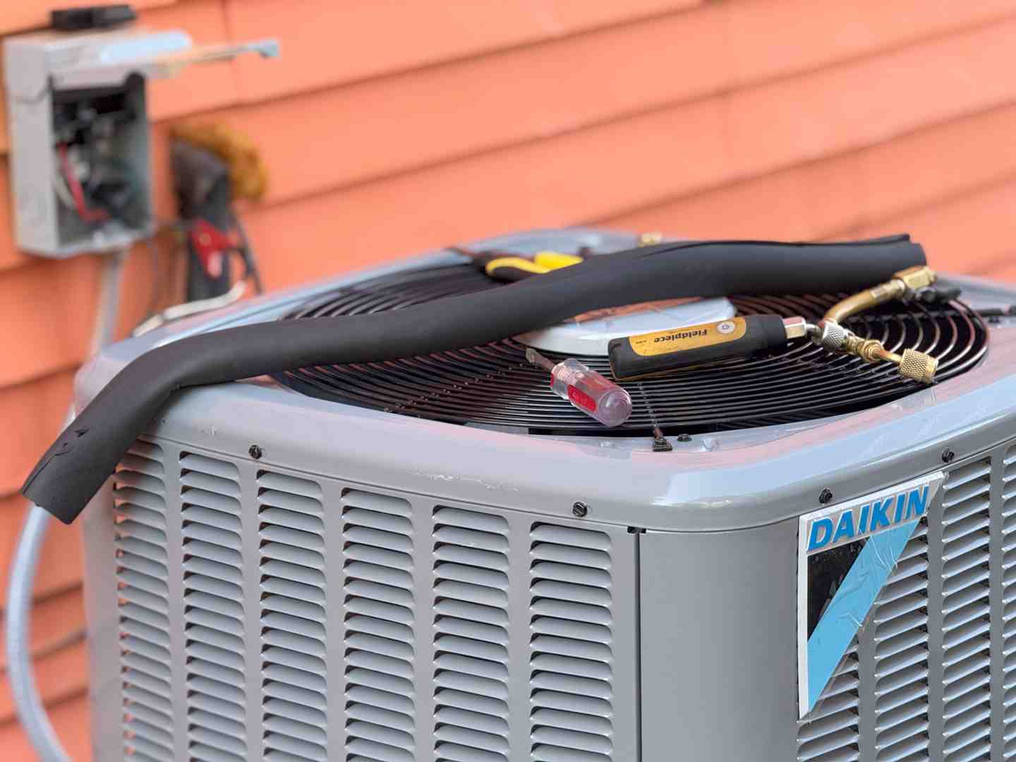 Hail damaged HVAC condenser fins close up - how indiana severe weather affects your hvac system