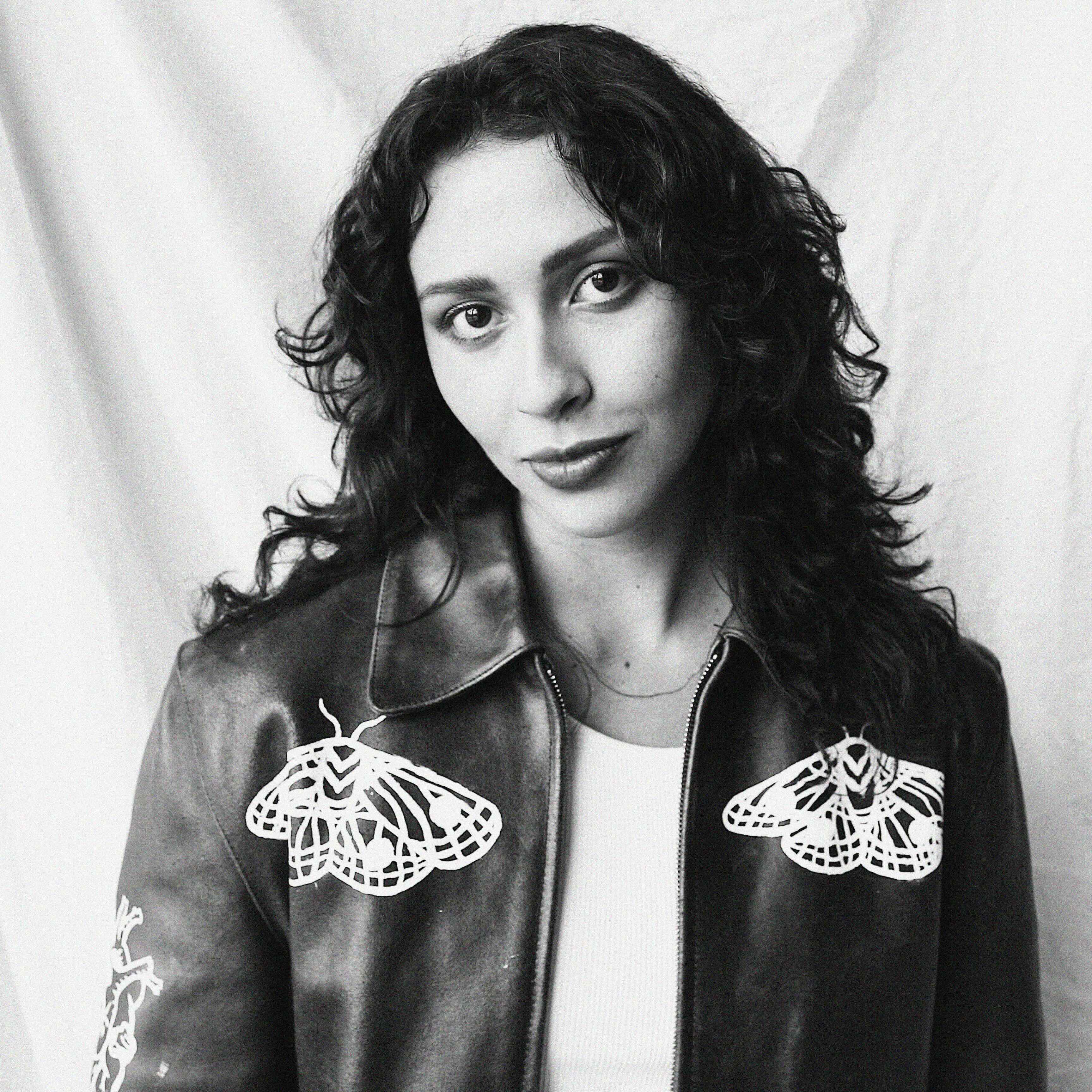 Black and white headshot image of woman