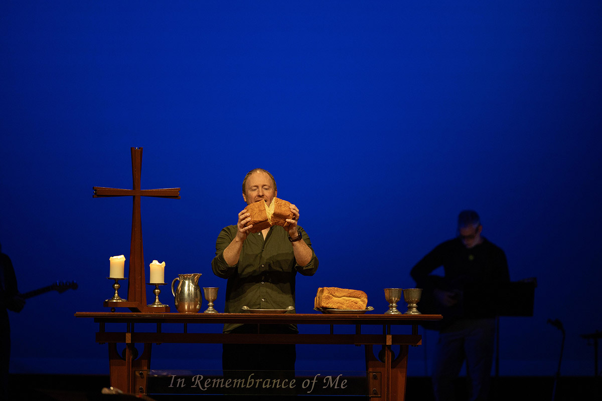 Pastor Brett Cheek on stage, Cape Campus.