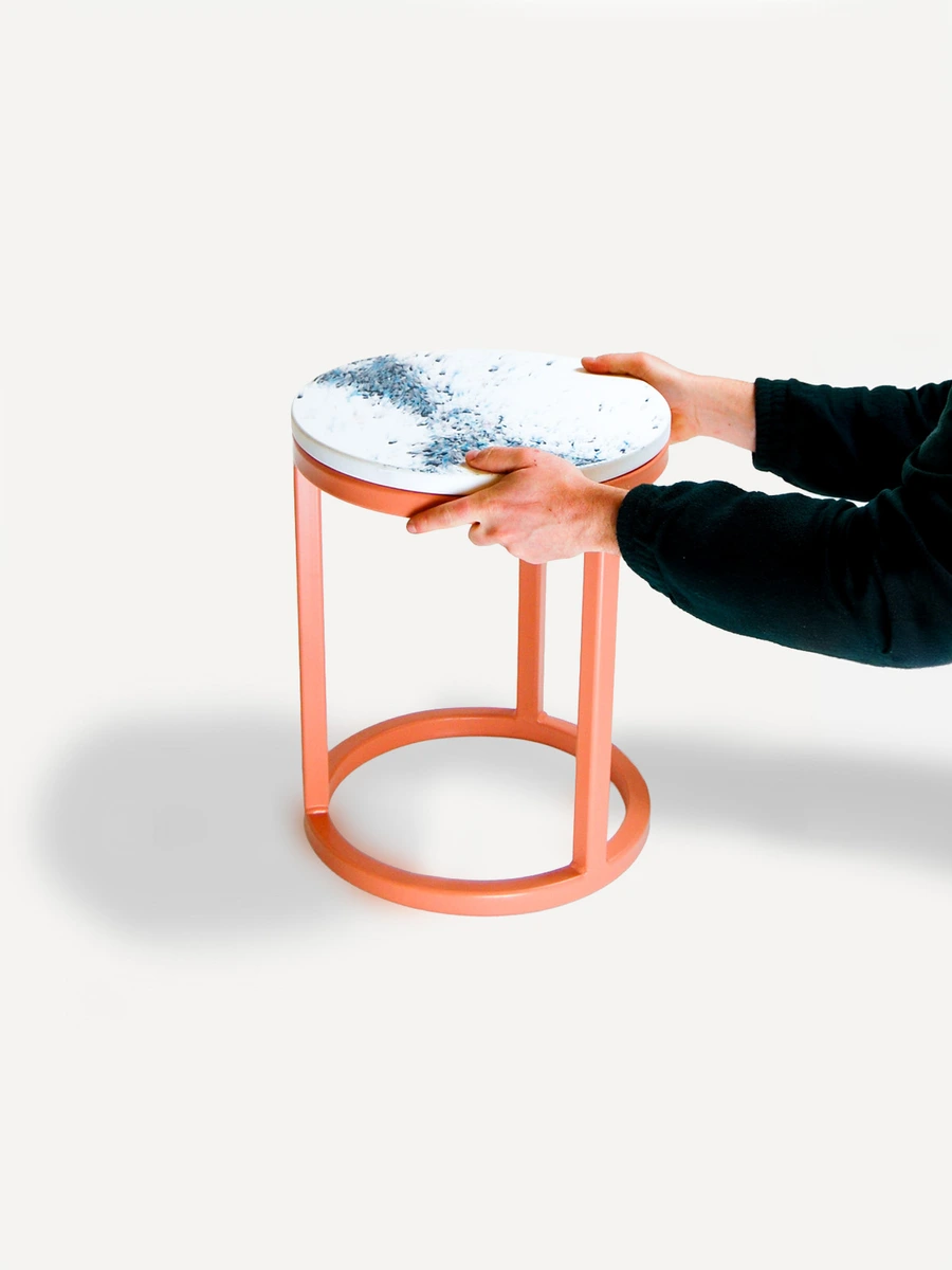 Sustainable Orbit table / low stool with vibrant colours from repurposed materials.