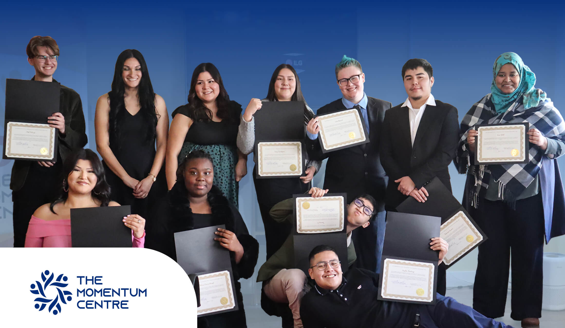 Graduates of TMC’s Momentum Now! proudly share certificates, celebrating career advancement, personal growth & success. 