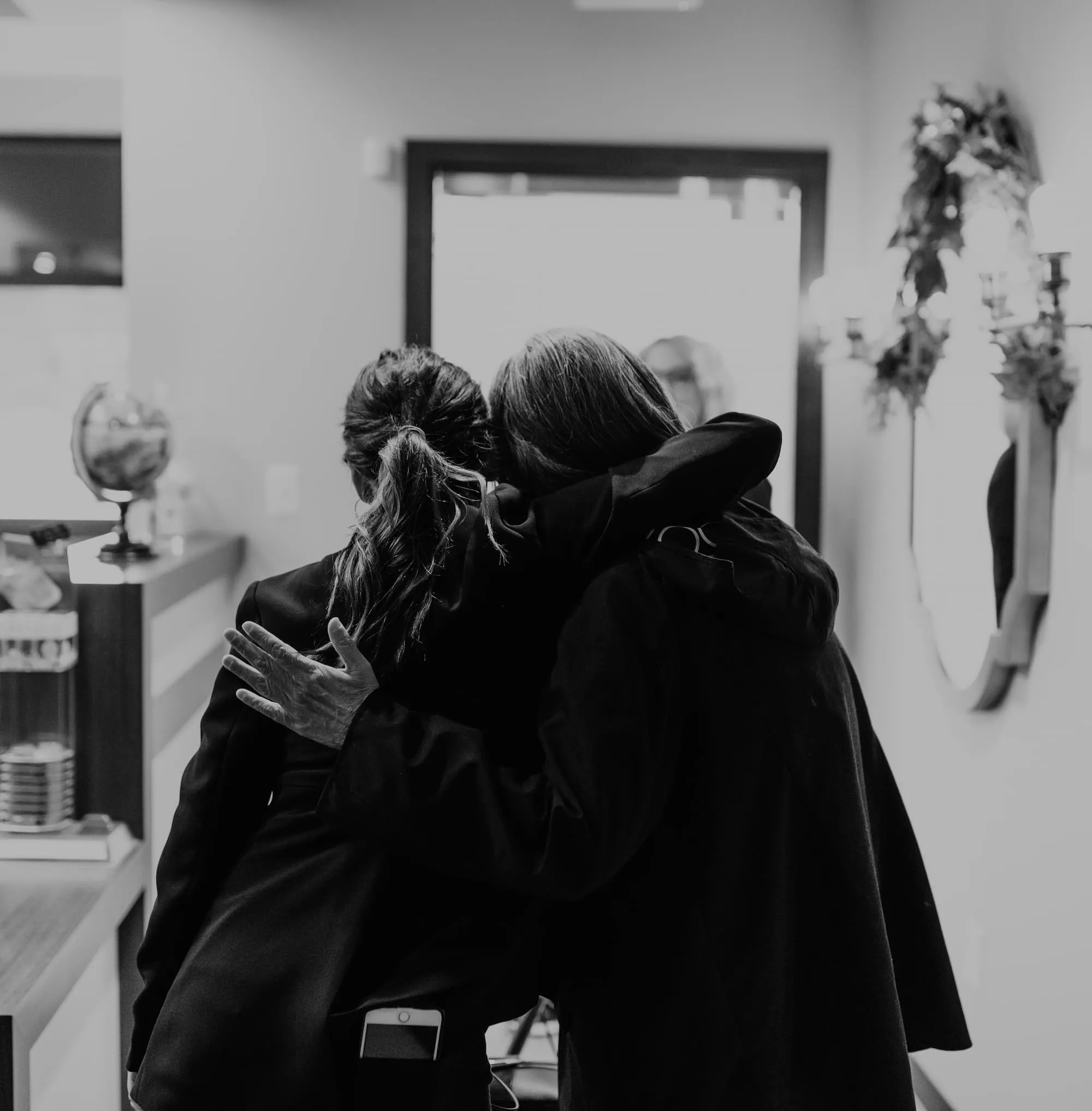 Dr. Gray hugging a patient