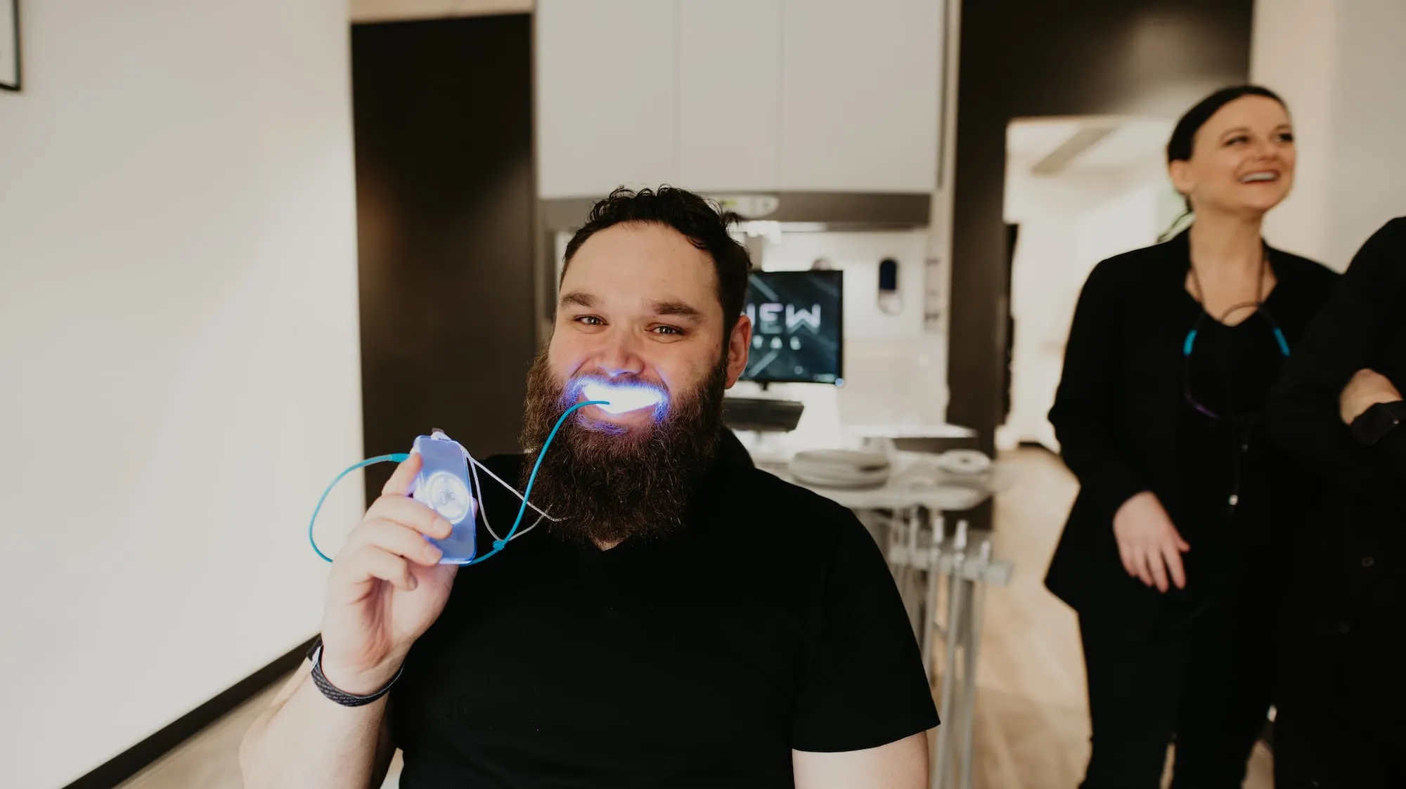 patient getting professional teeth whitening
