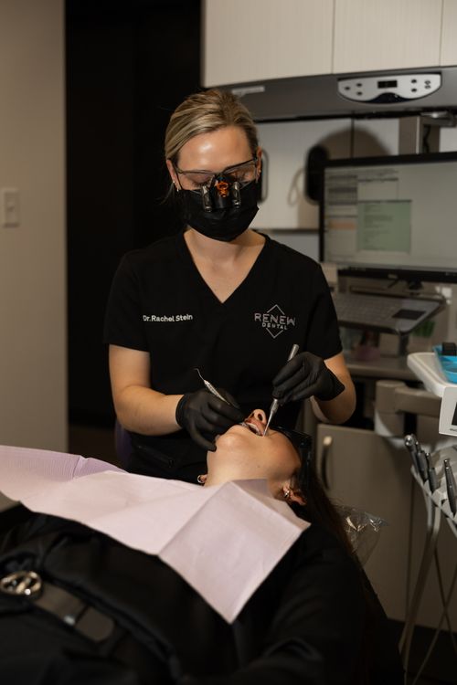 Dr. Stein using high-tech tools and equipment during treatment