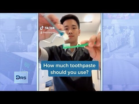 Dr. Gao teaching the public the right amount of toothpaste to use.