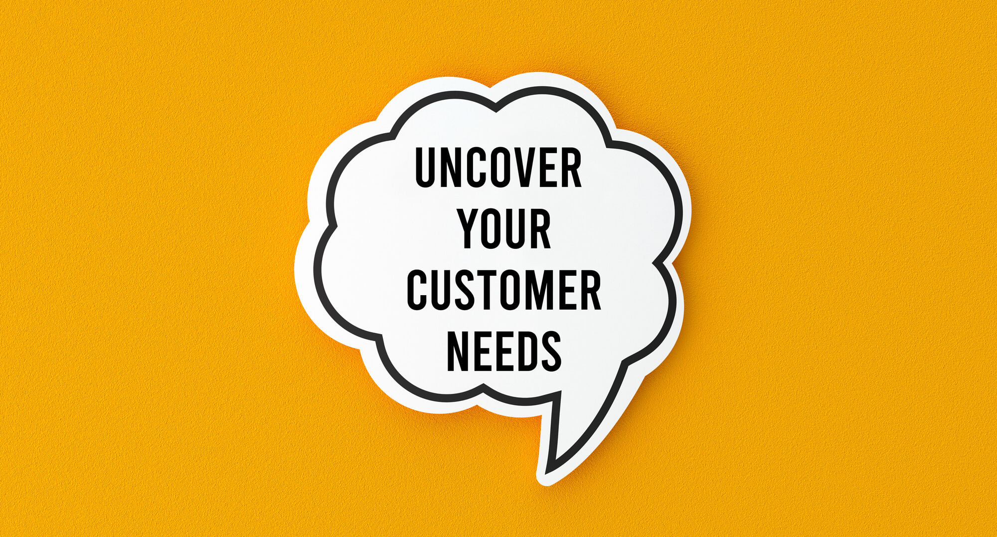 thought bubble with text saying uncover your customer needs