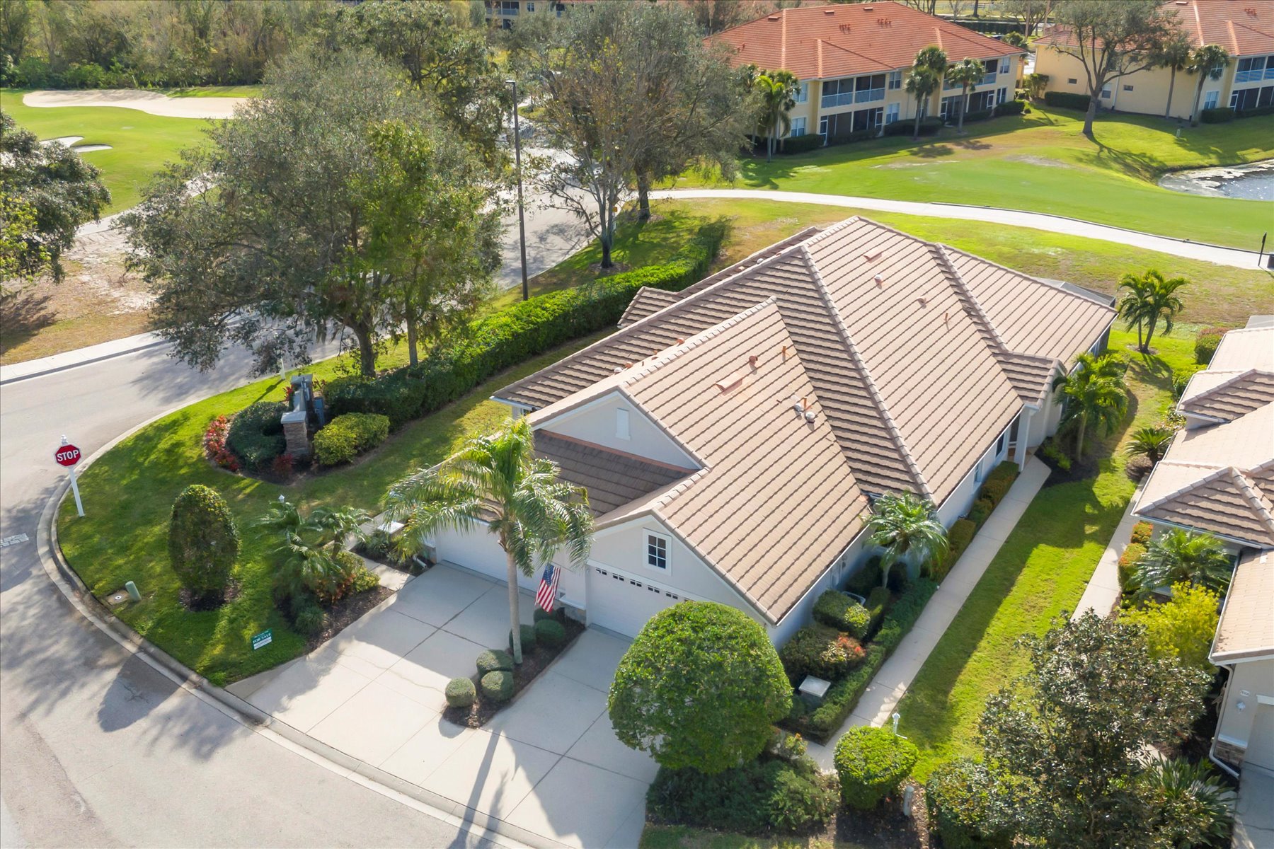 A high-angle shot showcasing the property’s curb appeal, landscaping, and neighborhood setting.