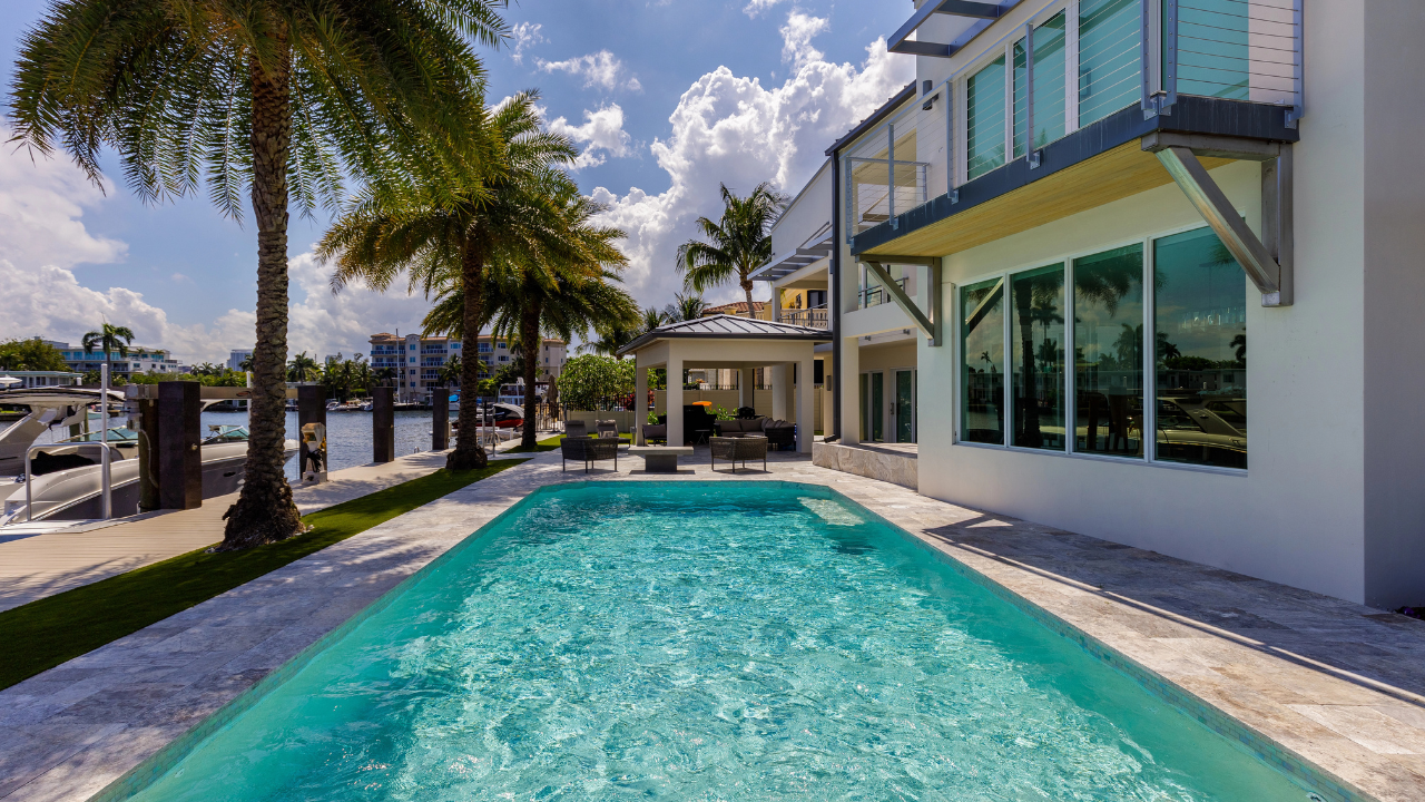 Dockside home with a boat – Highlighting waterfront properties with private docks, perfect for boating enthusiasts.