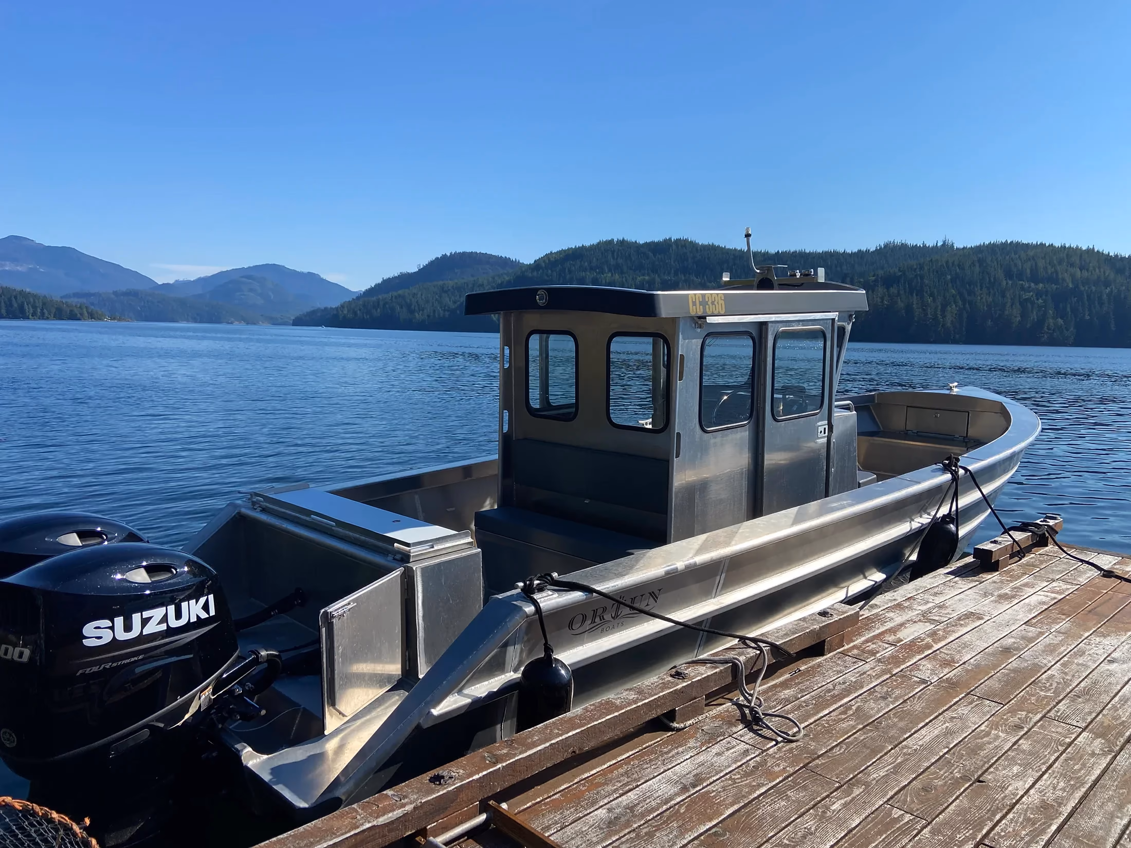 Ortun CC336 aluminum workboat for sale by Whiskey Creek Marine, hero exterior view.