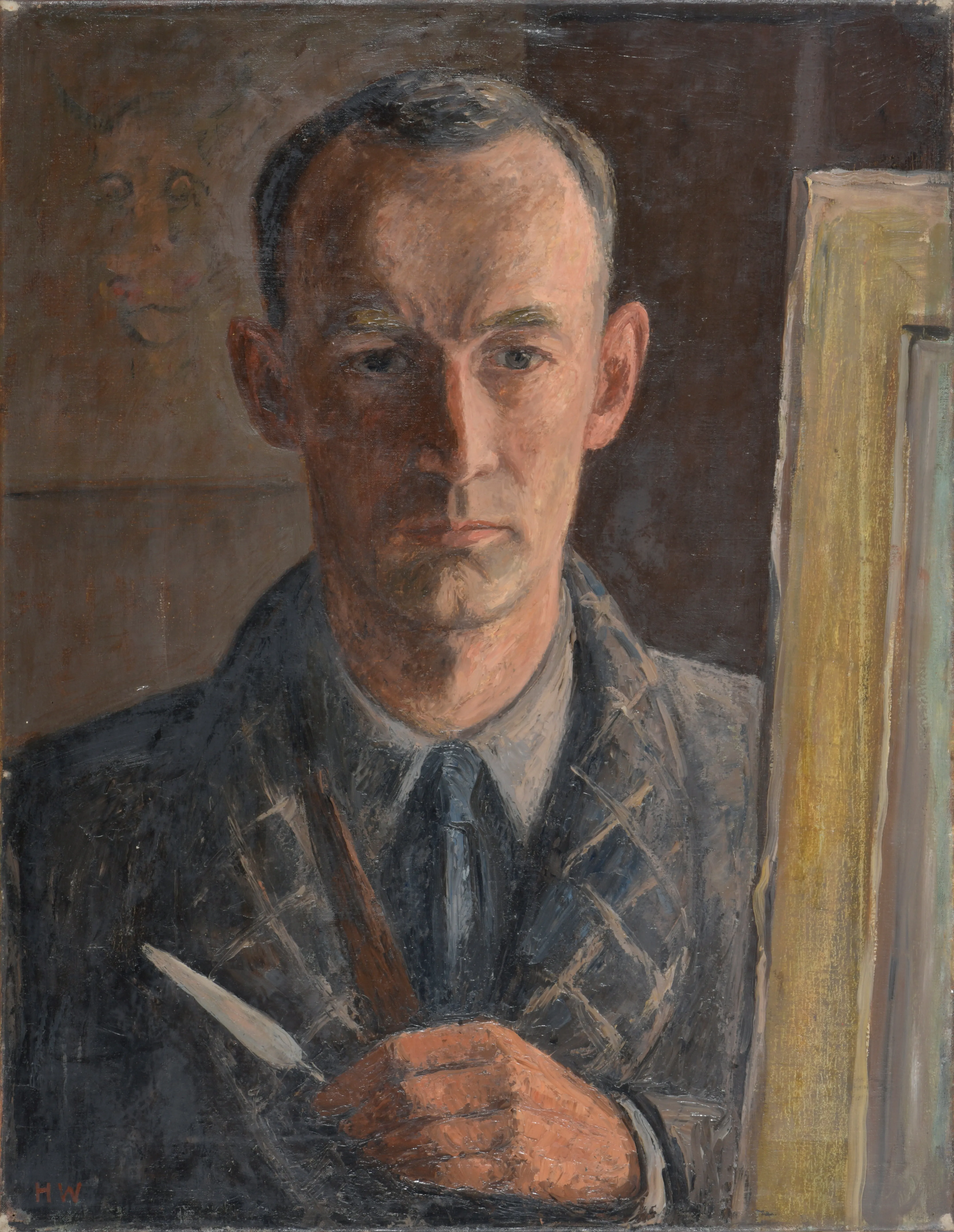 Portrait of a serious man wearing a checkered jacket and tie, holding a paintbrush and a knife next to a canvas.
