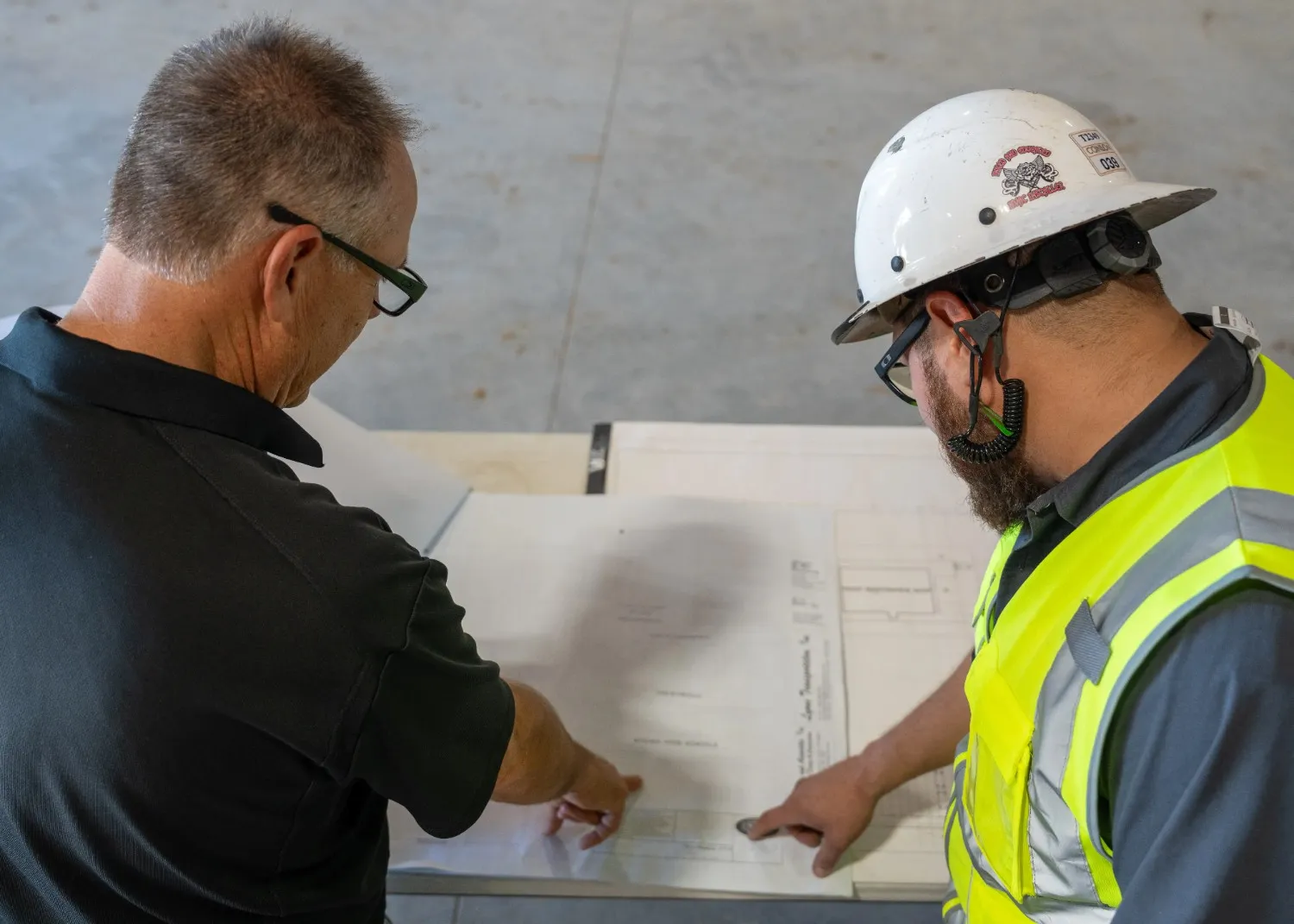 Technicians installing evaporative units