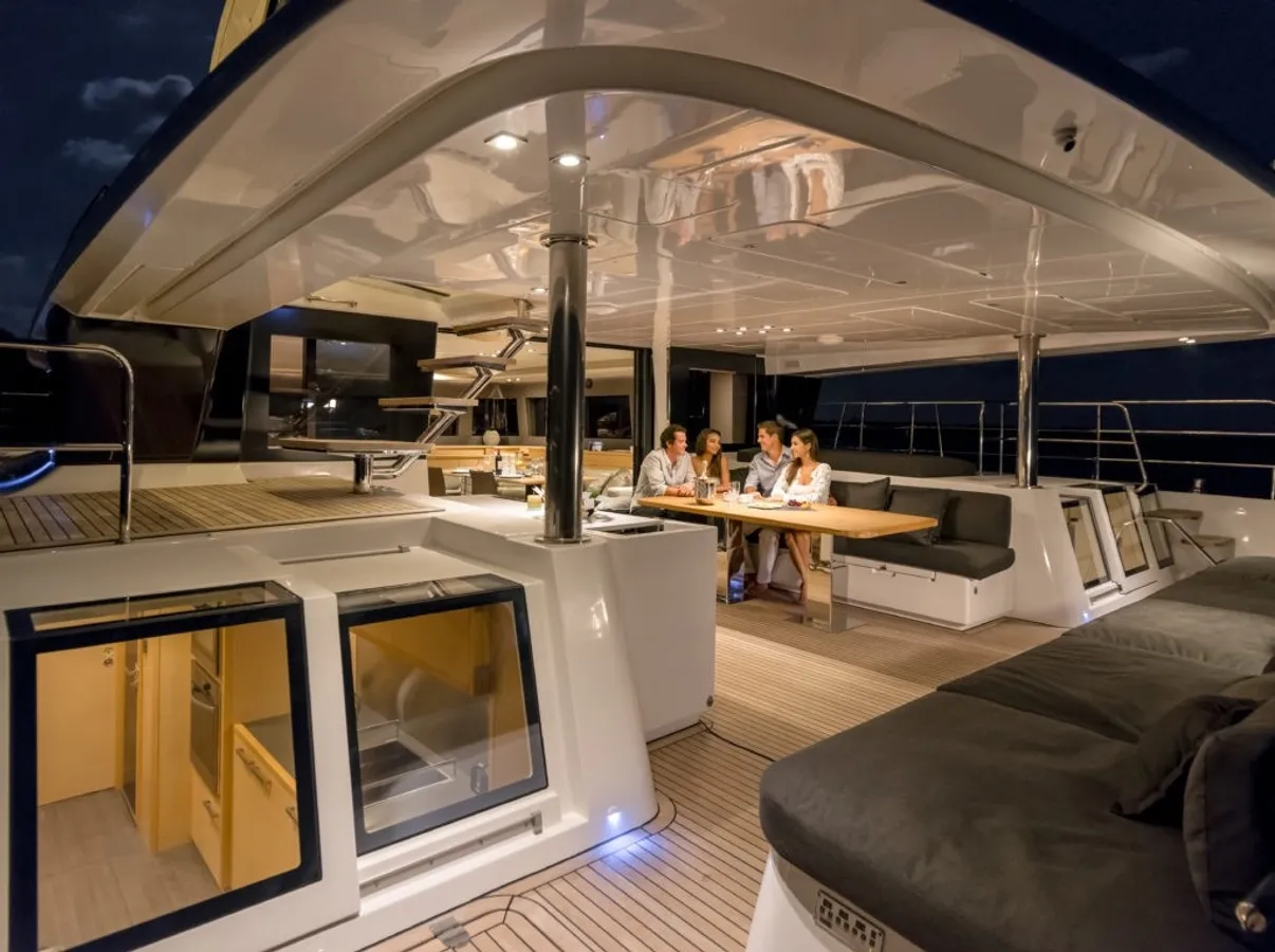 ALLGERA - Lagoon 630 aft deck at sunset