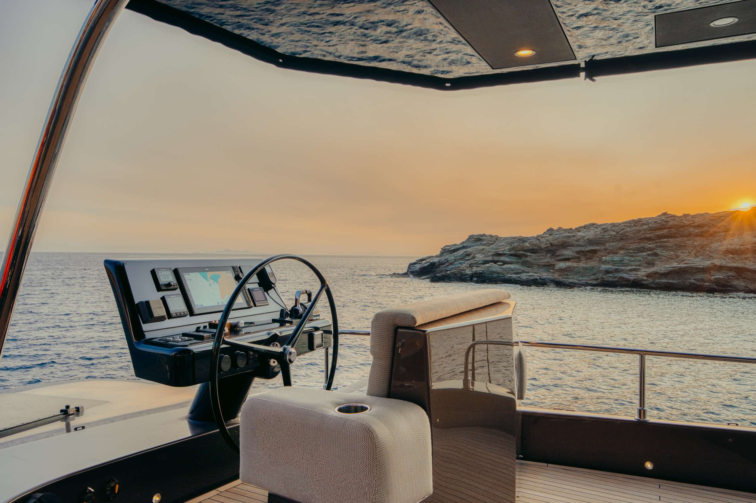 HONEYMOON - Moon Yacht 65 helm station at sunset