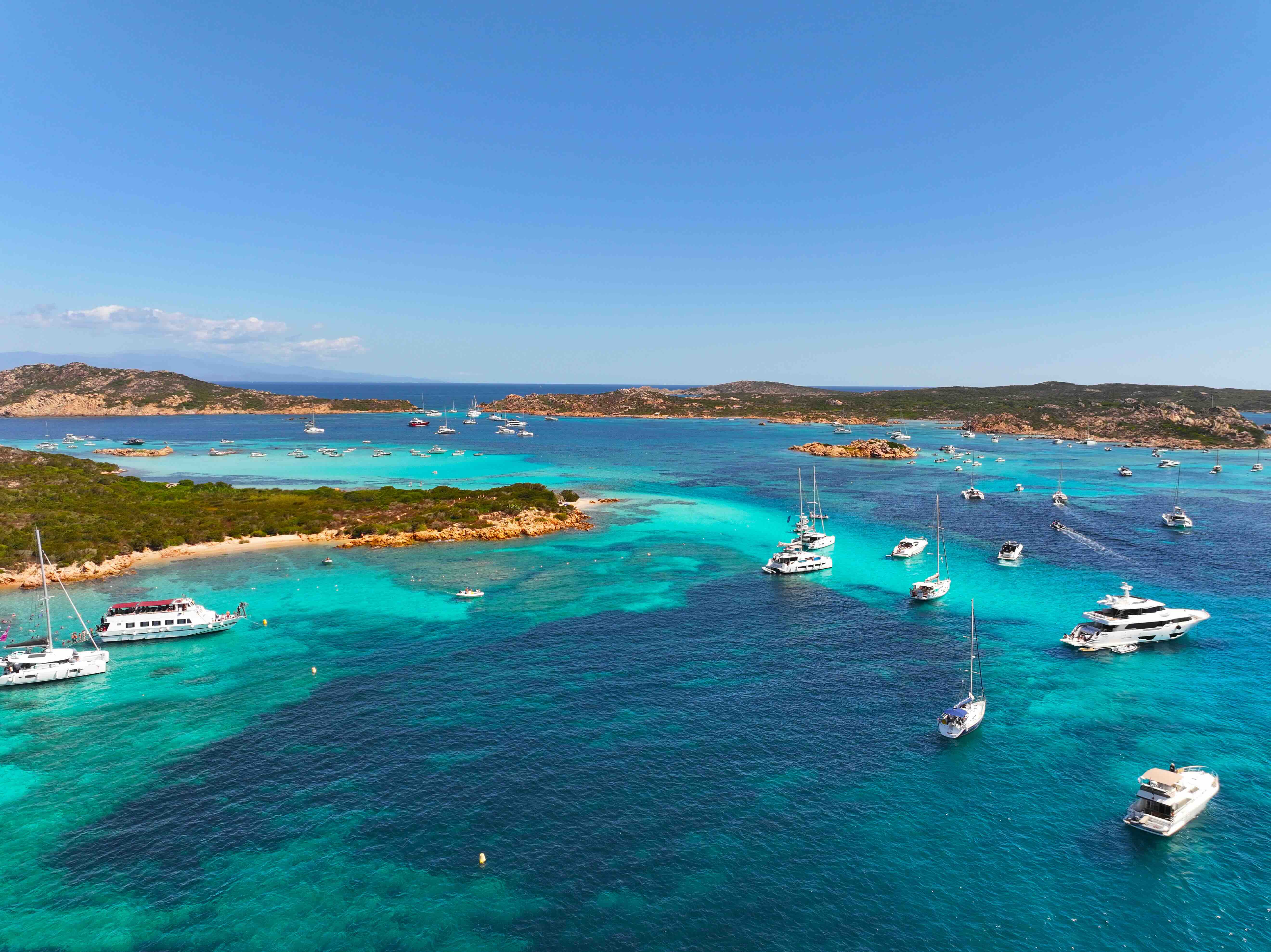 Yachts at anchor in Isola Budelli. Arcipelago della Maddalena. Island Budelli. Sardinia, Italy. Beaches of Sardinia. 