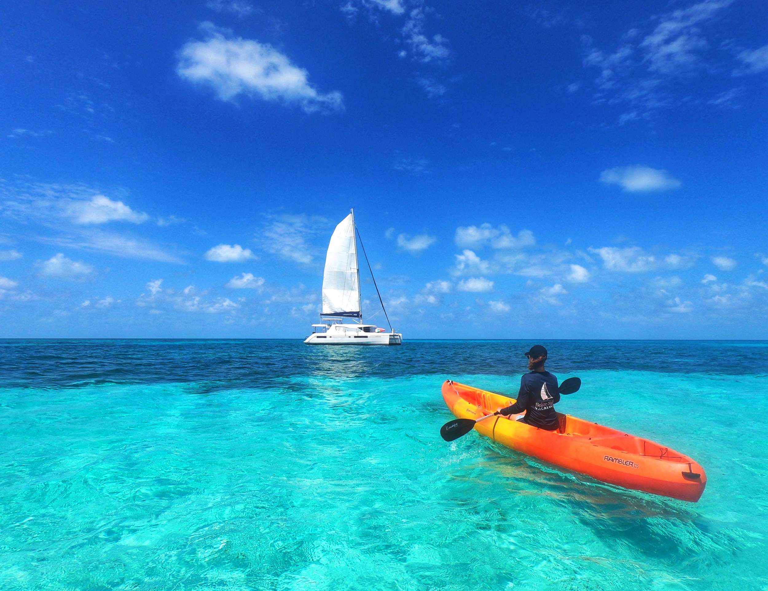 Guest Kayaking in torquiose waters in Belize