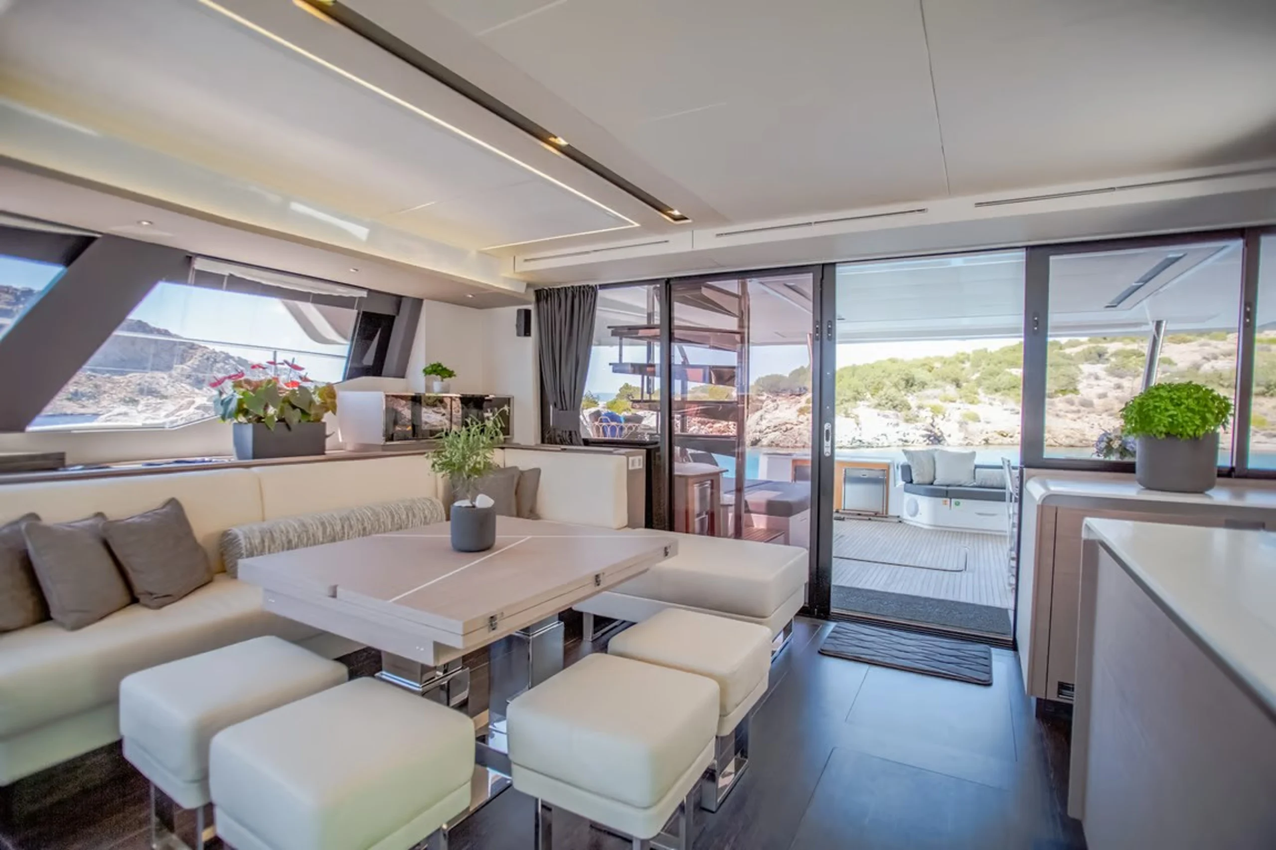 CORE - Fountaine Pajot 67 Power Catamaran interior dining area