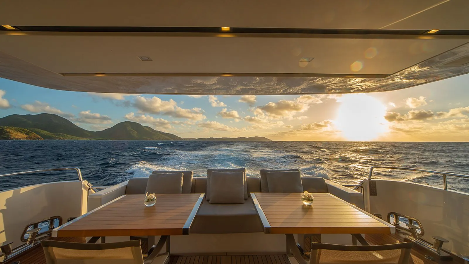SQUALO - Sanlorenzo SL86 Bahamas Crewed Motor Yacht Charter aft deck at sunset