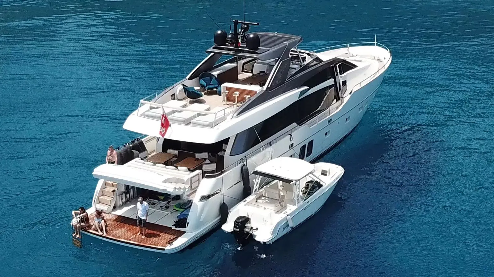 SQUALO - Sanlorenzo SL86 Bahamas Crewed Motor Yacht Charter an anchor with tender